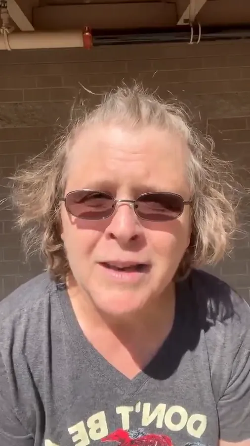 Member in her sixties speaking to camera